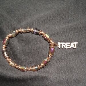 Elegant Multicolor Beaded Bracelet with 'TREAT' Charm